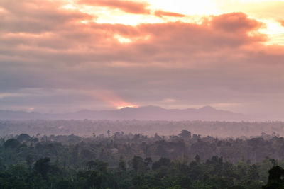 Scenic view of landscape against sky during sunset