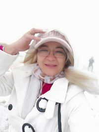 Portrait of a smiling girl in snow