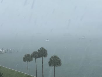 Scenic view of sea against sky during rainy season