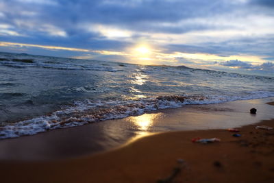 Scenic view of sea against dramatic sky