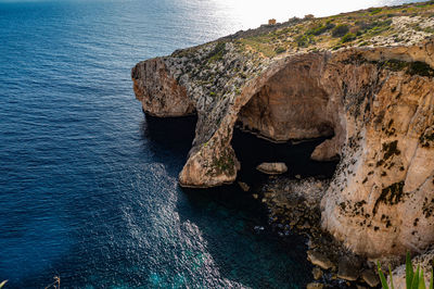 High angle view of rock formation on sea shore