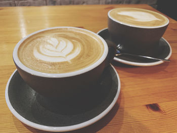 Close-up of cappuccino on table