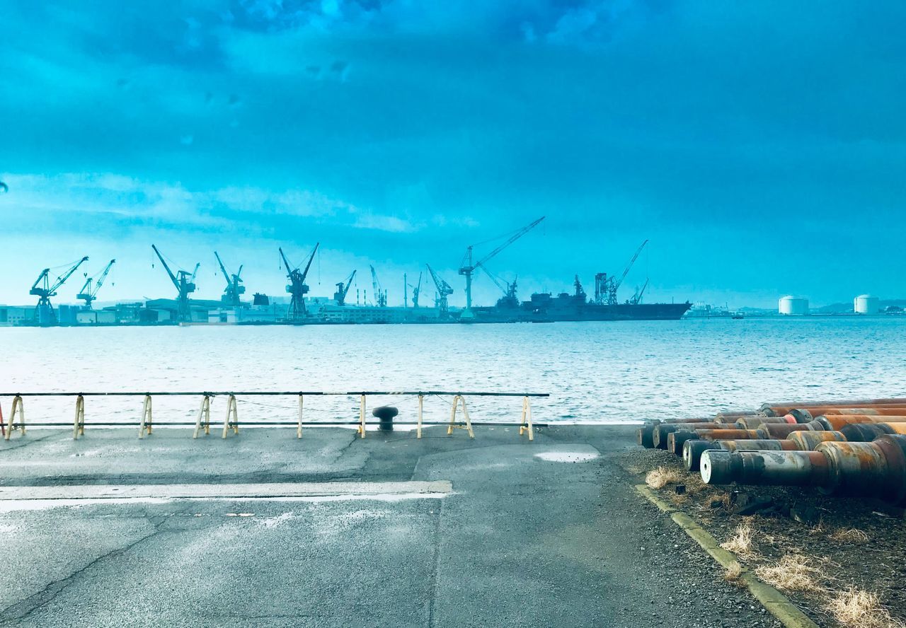 water, sea, transportation, pier, sky, nature, industry, commercial dock, crane - construction machinery, machinery, day, harbor, freight transportation, nautical vessel, shipping, business, cloud - sky, architecture, mode of transportation, no people, outdoors, sailboat, construction equipment