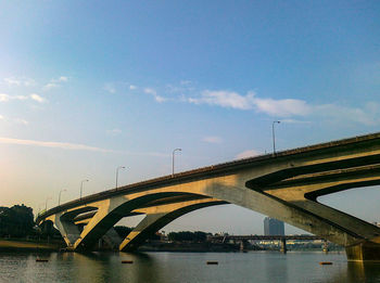 Low angle view of bridge over river