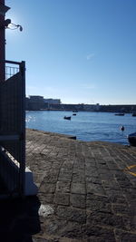 Scenic view of sea against blue sky