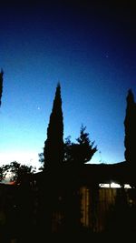 Low angle view of built structure against clear blue sky