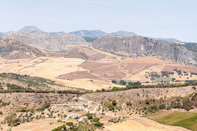 Scenic view of landscape and mountains against sky