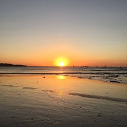 Scenic view of sea at sunset