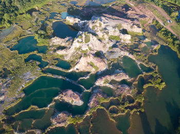 High angle view of rocks in sea