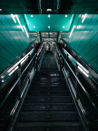 Low angle view of illuminated subway station