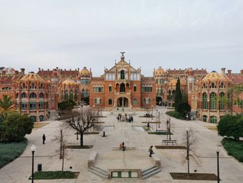 Buildings in city against sky