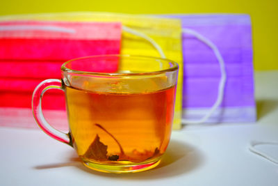 Close-up of tea in glass on table