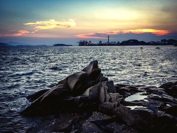 Scenic view of sea at sunset