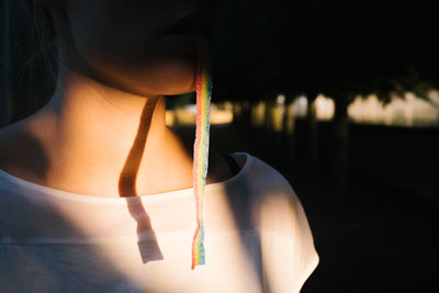 Close-up of woman against blurred background