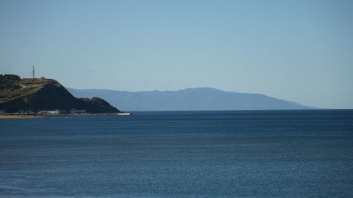 Scenic view of sea against clear sky