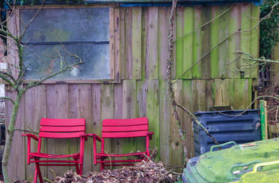 Abandoned chair outside house