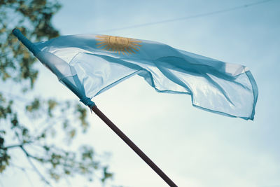 Low angle view of waving argentinian flag