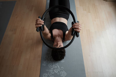 Group of women practicing pilates exercises in class