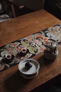 High angle view of tea set up on table