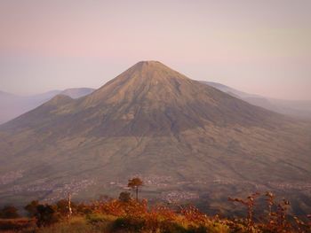 Scenic view of mountain against sky during sunset