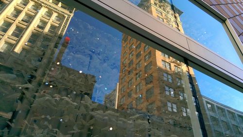 Low angle view of built structure against blue sky