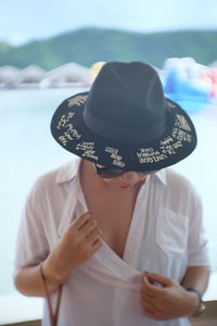 Close-up of woman wearing hat