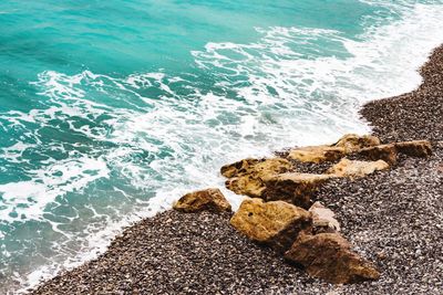 High angle view of rocks on beach