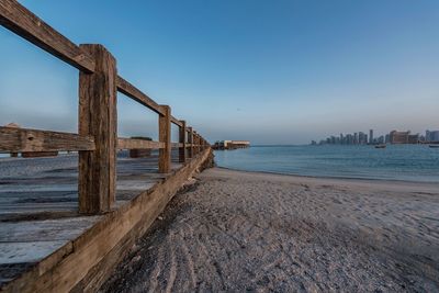 Scenic view of sea against clear blue sky