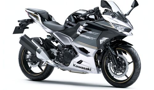 Close-up of motorcycle against white background