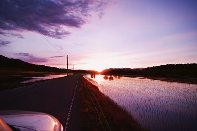 Road against sky during sunset