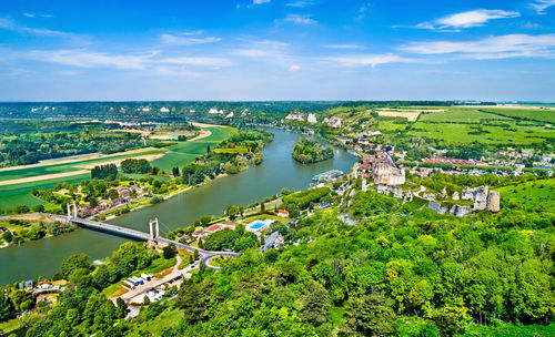 High angle view of trees and buildings against sky