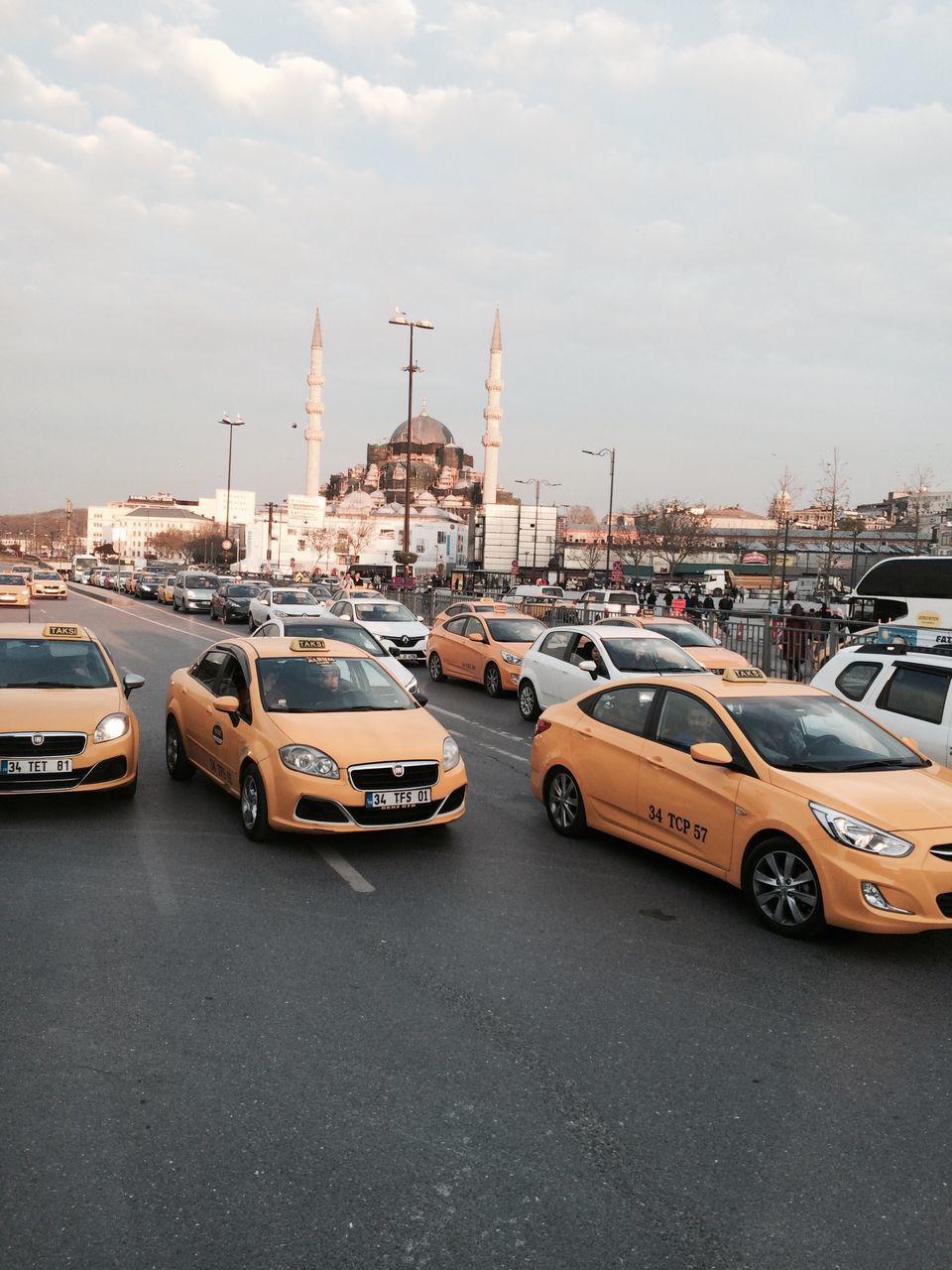 transportation, car, mode of transport, sky, traffic, land vehicle, city, no people, cloud - sky, outdoors, connection, architecture, day