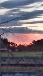 Scenic view of landscape against sky during sunset