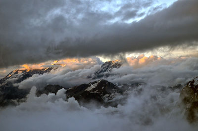 Scenic view of dramatic sky over mountain