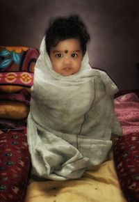 Portrait of cute baby at home