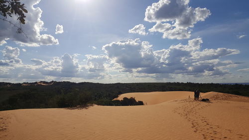 Panoramic view of desert against sky