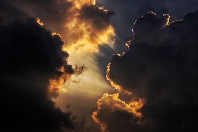 Low angle view of clouds in sky during sunset