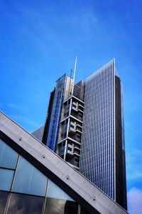 Low angle view of modern buildings against sky