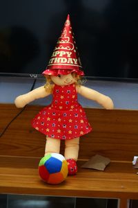 Close-up of girl with red umbrella