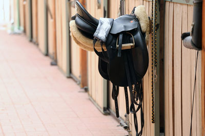 Rear view of man standing on footpath