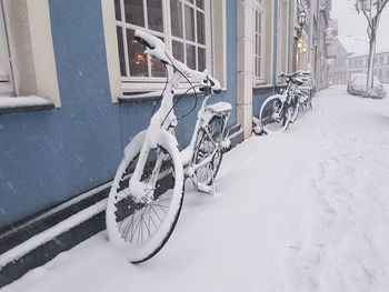 Bicycle parked in snow