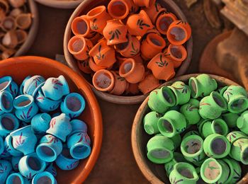 High angle view of colorful earthenware for sale in market