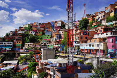 Buildings in city against sky