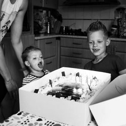 Portrait of smiling boy playing at home