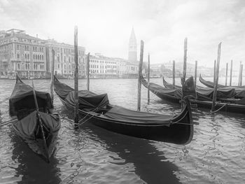 Boats moored in canal