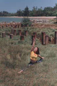 Woman in traditional clothing on field