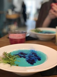 Close-up of drink served on table