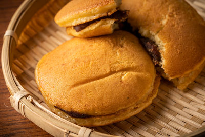 High angle view of bread in basket on table