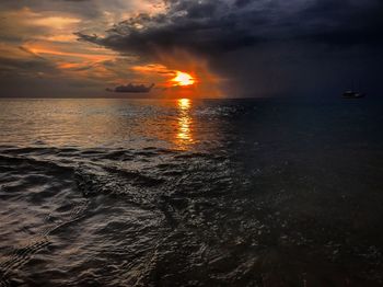 Scenic view of sea against sky during sunset