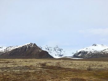 Scenic view of snow covered mountains